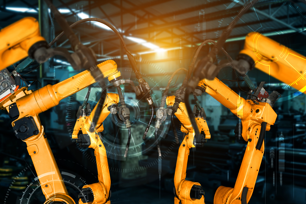 用于数字工厂生产技术的智能工业机器人手臂展示工业40或第四次工业革命的自动化制造过程和控制操作的物联网软件